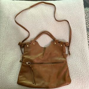 Leather purse with inside and outside pocket. Over the shoulder or clutch.